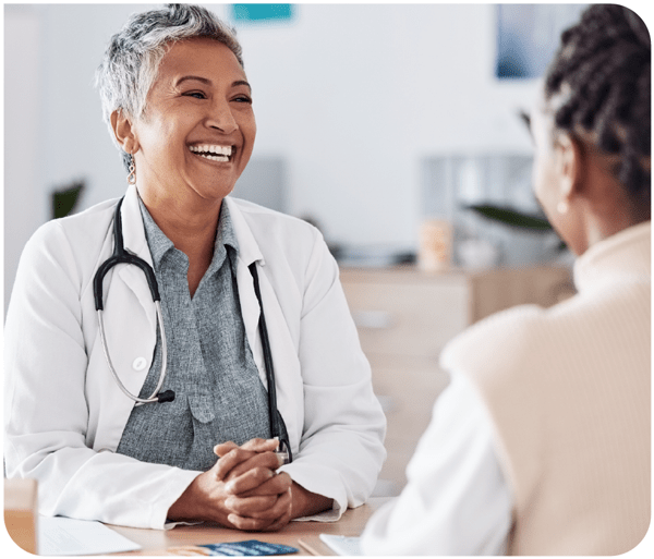Doctor smiling at patient