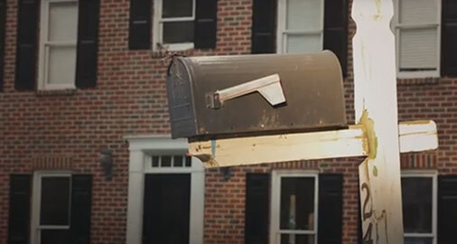 Old Mailbox in Front of Old House