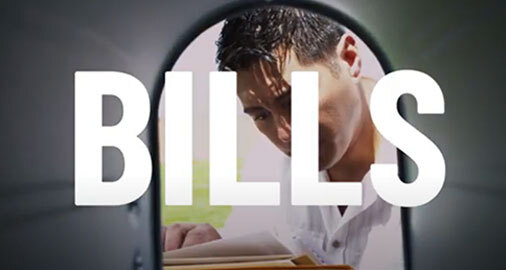 Man Looking into Mailbox to Find Bills