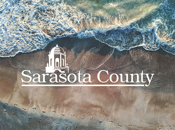 Birds Eye View Shoreline with Sarasota County Text Overlay