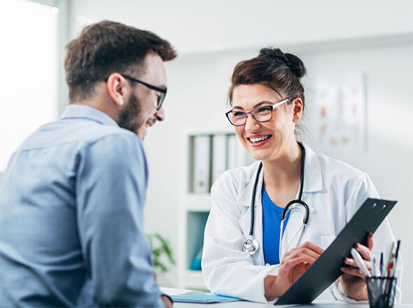 Doctor Showing Patient Paperwork