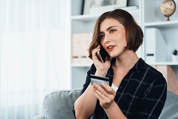 Woman with cc on phone min