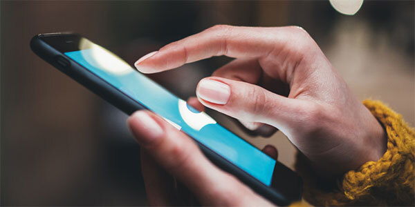 Female Hands Using Cellphone